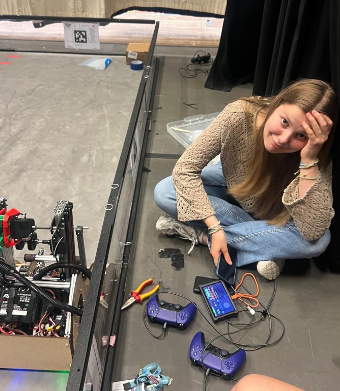 Emily configuring her team's robot.